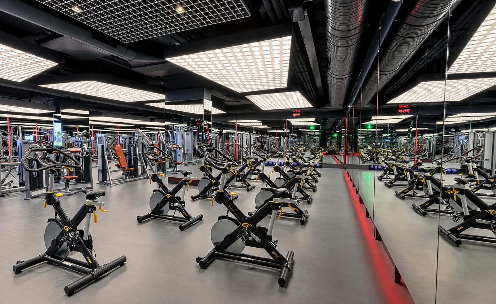 Square-panel stretch ceiling light fixture, gym application
